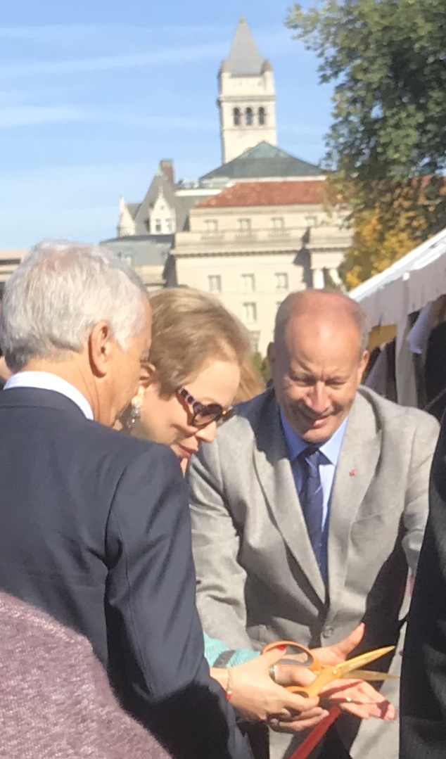 seniors holding a scissor